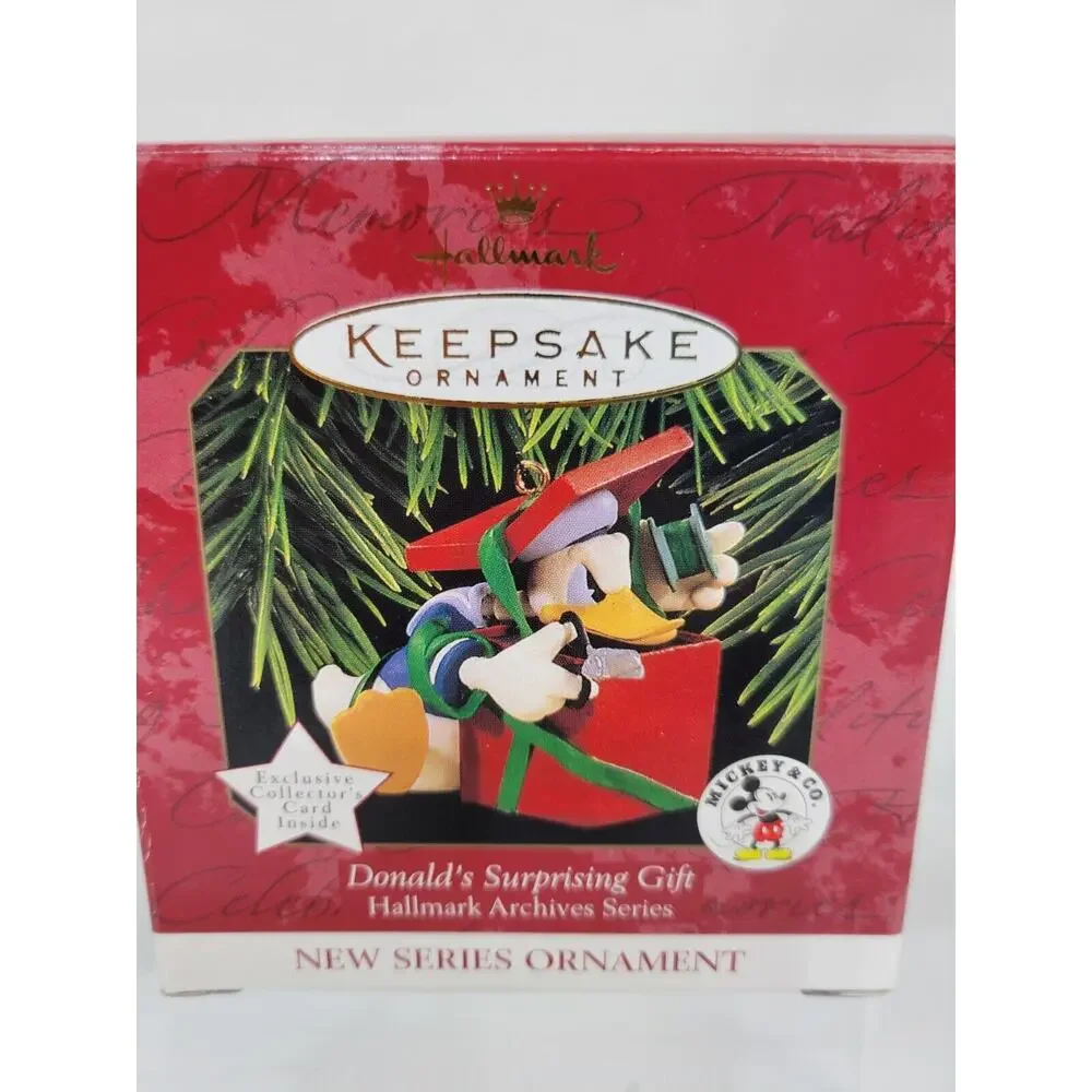 1997 Hallmark Keepsake Ornament Donald's Suprising Gift NIB